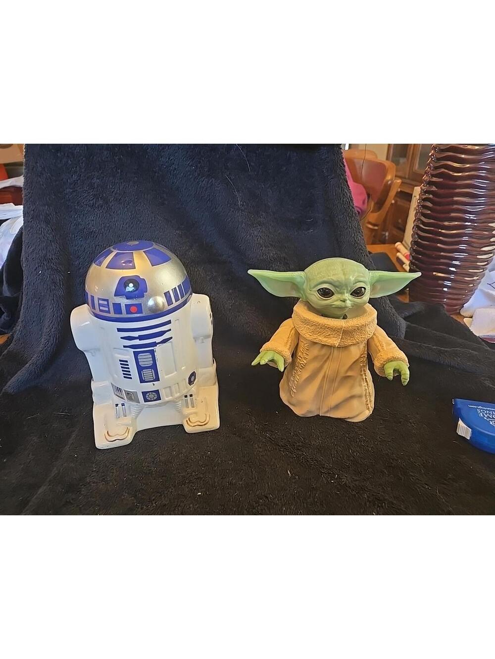R2D2 coin bank and grogu figure